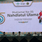 Pembacaan berita acara penetapan KH Abdul Hakim Mahfudz (Gus Kikin) sebagai Ketua Umum PBNU 2026-2031 oleh anggota AHWA.