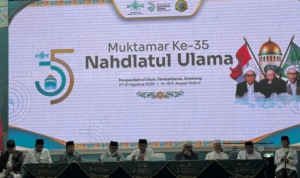 Pembacaan berita acara penetapan KH Abdul Hakim Mahfudz (Gus Kikin) sebagai Ketua Umum PBNU 2026-2031 oleh anggota AHWA.